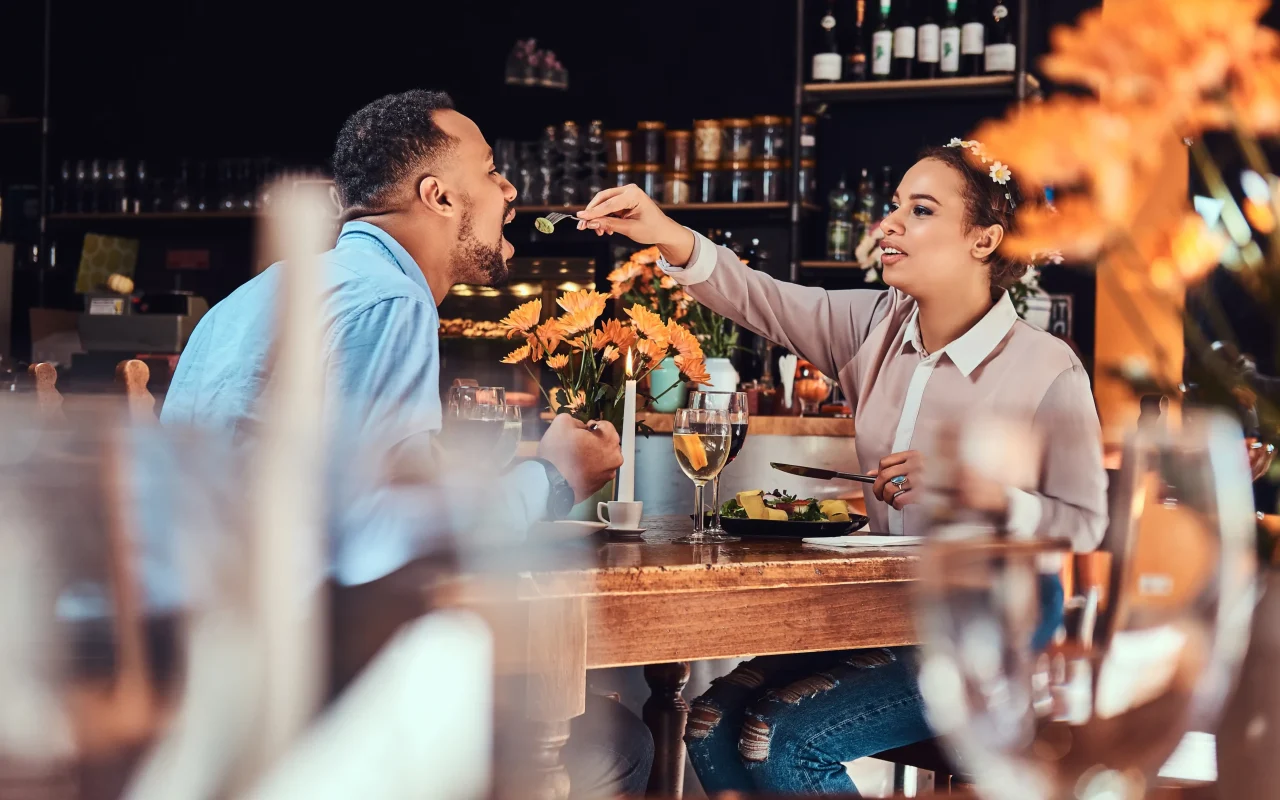 beautiful-african-american-couple-love-having-great-time-together-their-dating-attractive-couple-enjoying-each-other-young-woman-feeding-her-man-restaurant